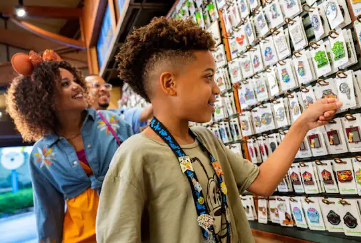 Mother and son browsing Disney pins together